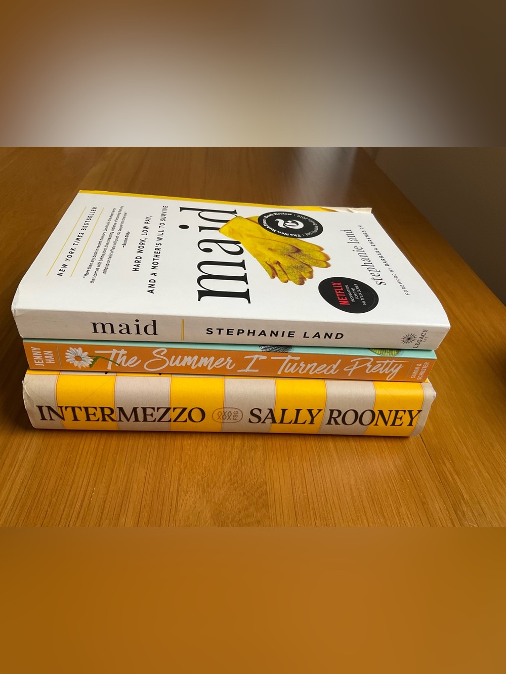 Three Bestselling Books - Sally Rooney, Jenny Han, and Stephanie Land